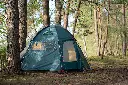 large-tourist-tent-is-set-up-campground-beautiful-forest-by-lake.webp